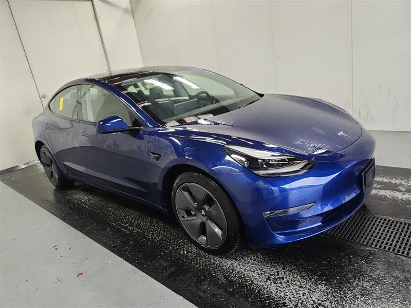 used 2023 Tesla Model 3 car, priced at $27,995