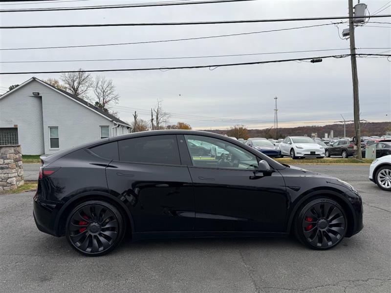 used 2023 Tesla Model Y car, priced at $36,995