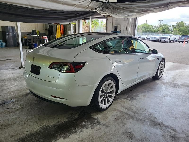 used 2023 Tesla Model 3 car, priced at $26,995