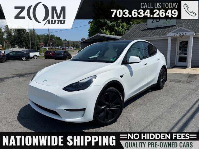 used 2024 Tesla Model Y car, priced at $34,995