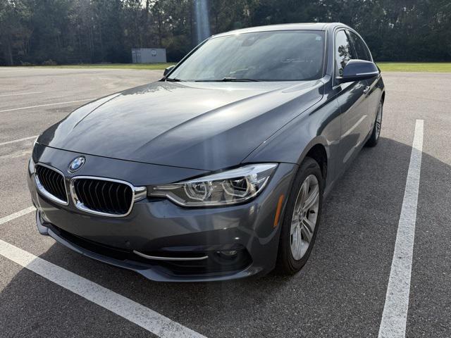 used 2018 BMW 330 car, priced at $17,171