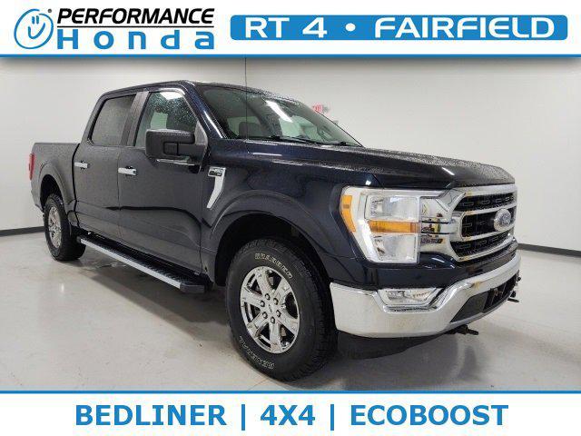 used 2021 Ford F-150 car, priced at $32,244