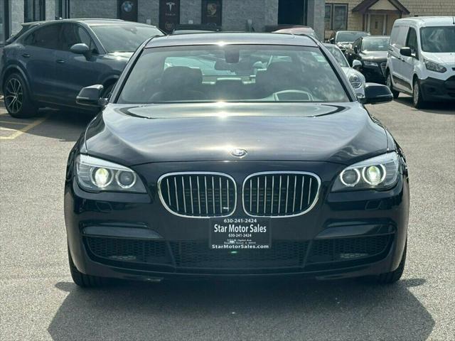 used 2014 BMW 750 car, priced at $18,988