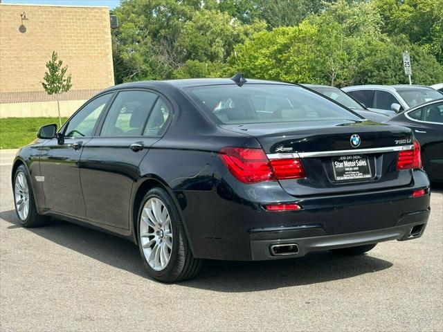 used 2014 BMW 750 car, priced at $18,988