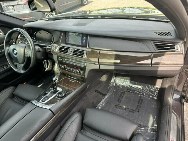 used 2014 BMW 750 car, priced at $18,988