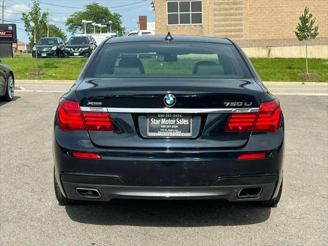 used 2014 BMW 750 car, priced at $18,988