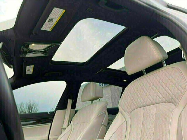 used 2018 BMW 750 car, priced at $25,985