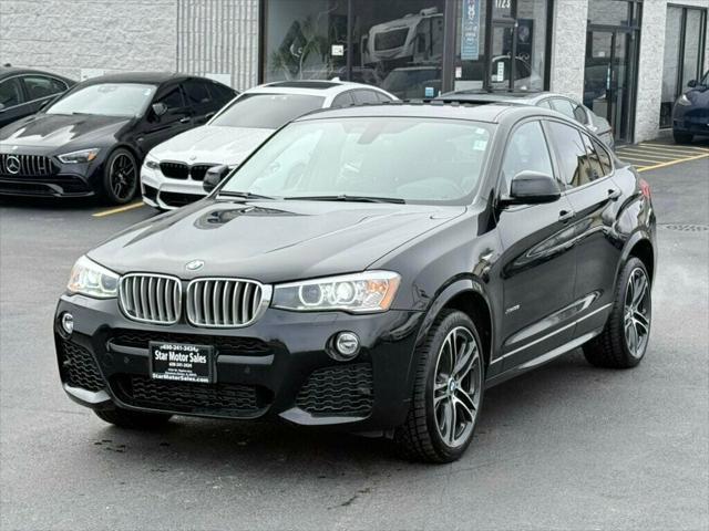 used 2015 BMW X4 car, priced at $18,495