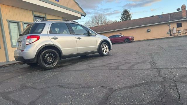 used 2010 Suzuki SX4 car, priced at $6,000