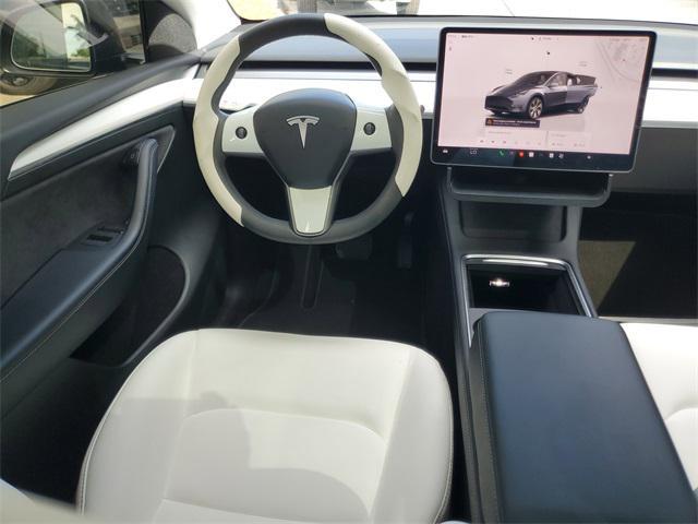 used 2023 Tesla Model Y car, priced at $28,250