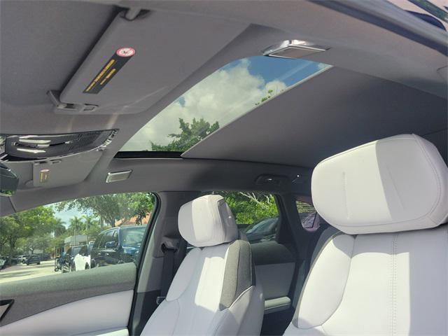 new 2025 Cadillac OPTIQ car, priced at $54,990