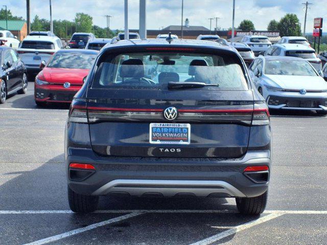 new 2025 Volkswagen Taos car, priced at $25,864