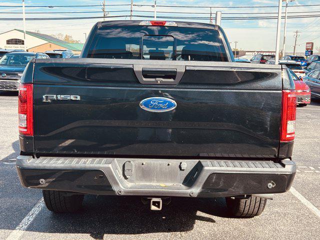 used 2015 Ford F-150 car, priced at $15,000