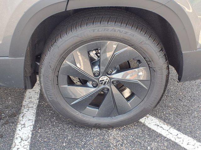 new 2025 Volkswagen Taos car, priced at $25,864
