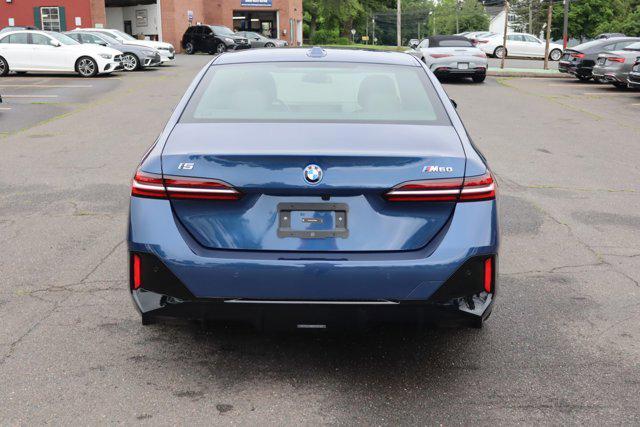 used 2024 BMW i5 car, priced at $58,888