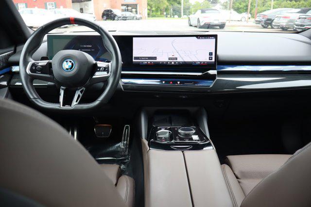 used 2024 BMW i5 car, priced at $58,888