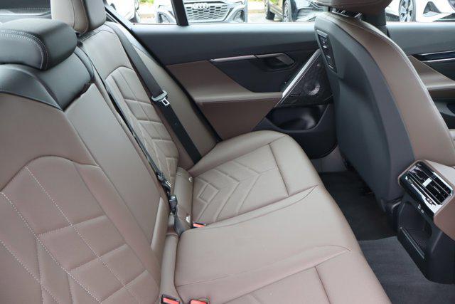 used 2024 BMW i5 car, priced at $58,888