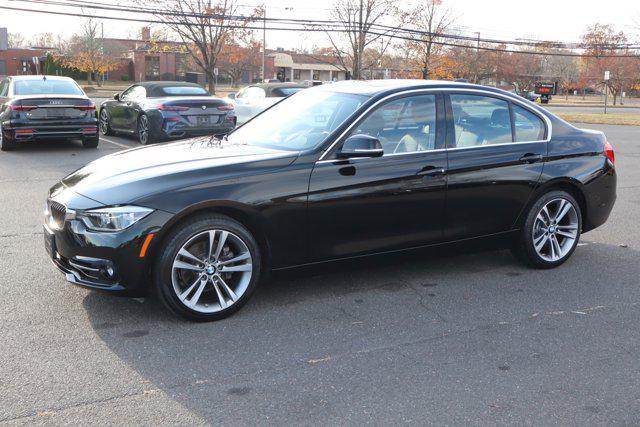 used 2018 BMW 330 car, priced at $19,995