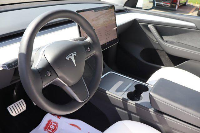 used 2023 Tesla Model Y car, priced at $31,000