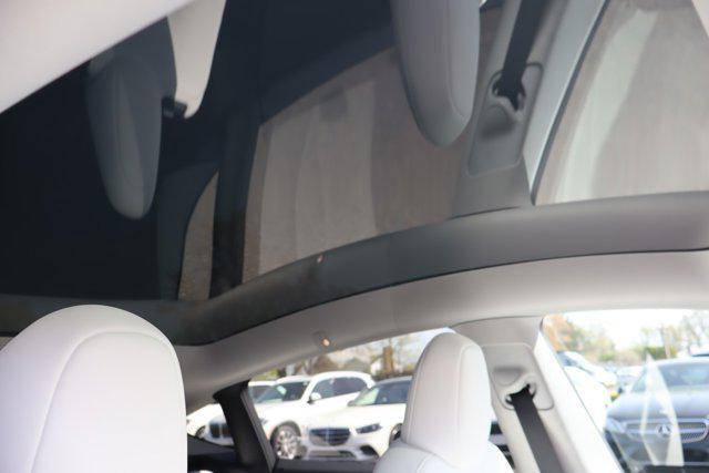 used 2023 Tesla Model Y car, priced at $31,000