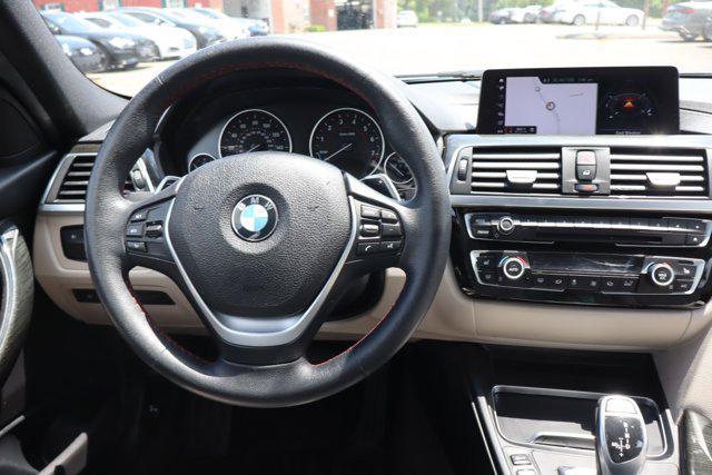 used 2018 BMW 330 car, priced at $19,630