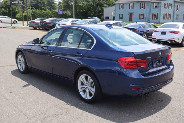 used 2018 BMW 330 car, priced at $19,630