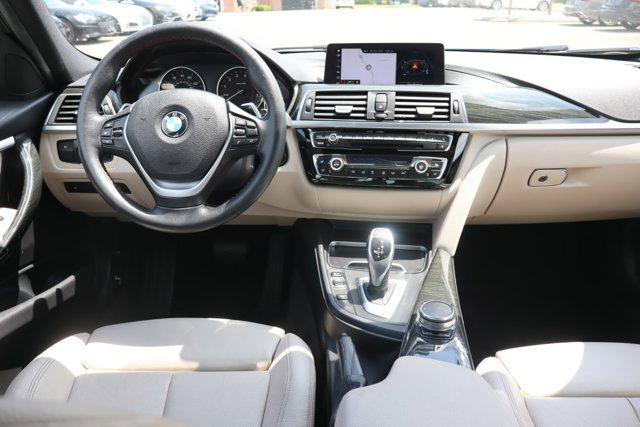 used 2018 BMW 330 car, priced at $19,630