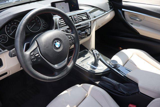 used 2018 BMW 330 car, priced at $19,630