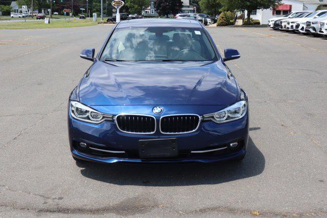 used 2018 BMW 330 car, priced at $19,630