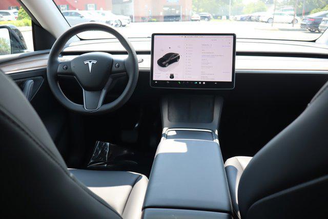 used 2023 Tesla Model Y car, priced at $34,995