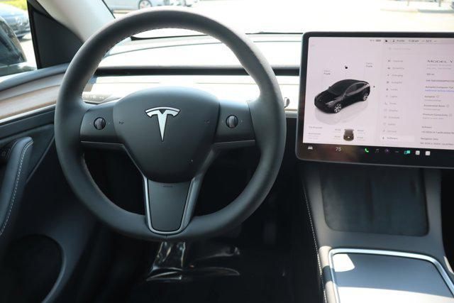 used 2023 Tesla Model Y car, priced at $34,995