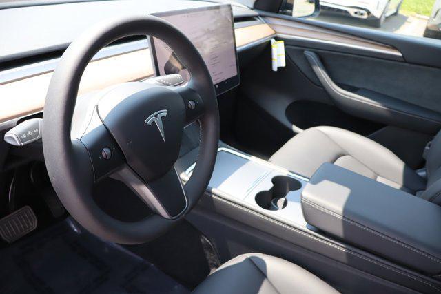 used 2023 Tesla Model Y car, priced at $34,995