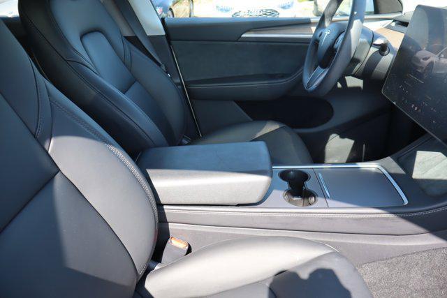 used 2024 Tesla Model Y car, priced at $34,995