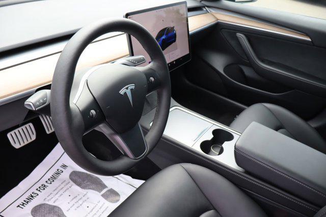 used 2023 Tesla Model 3 car, priced at $31,995
