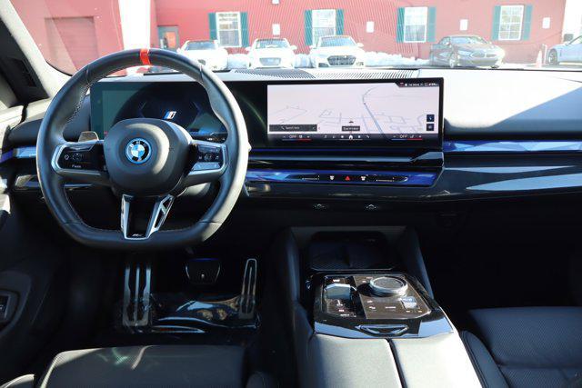 used 2024 BMW i5 car, priced at $65,995