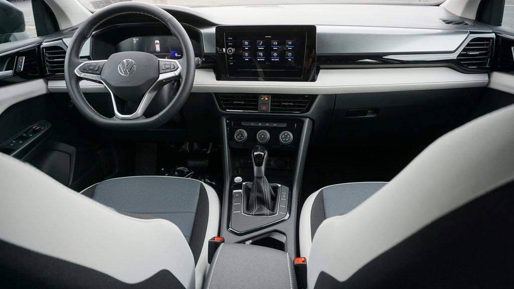 new 2025 Volkswagen Taos car, priced at $27,011