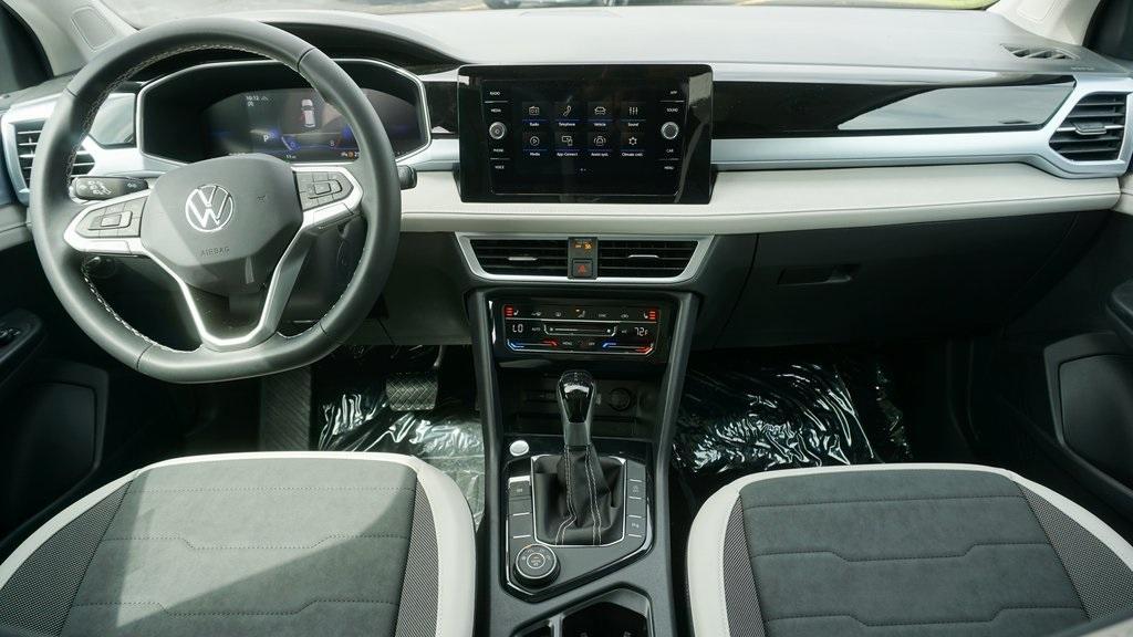 new 2025 Volkswagen Taos car, priced at $33,094