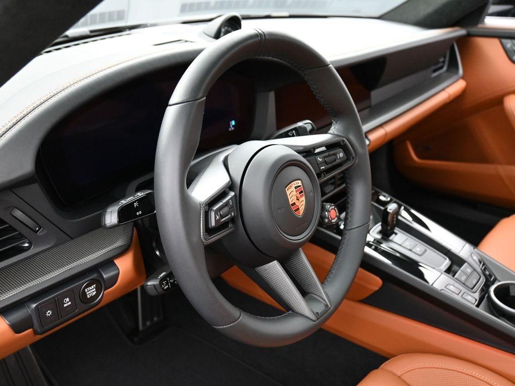 new 2026 Porsche 911 car, priced at $208,470