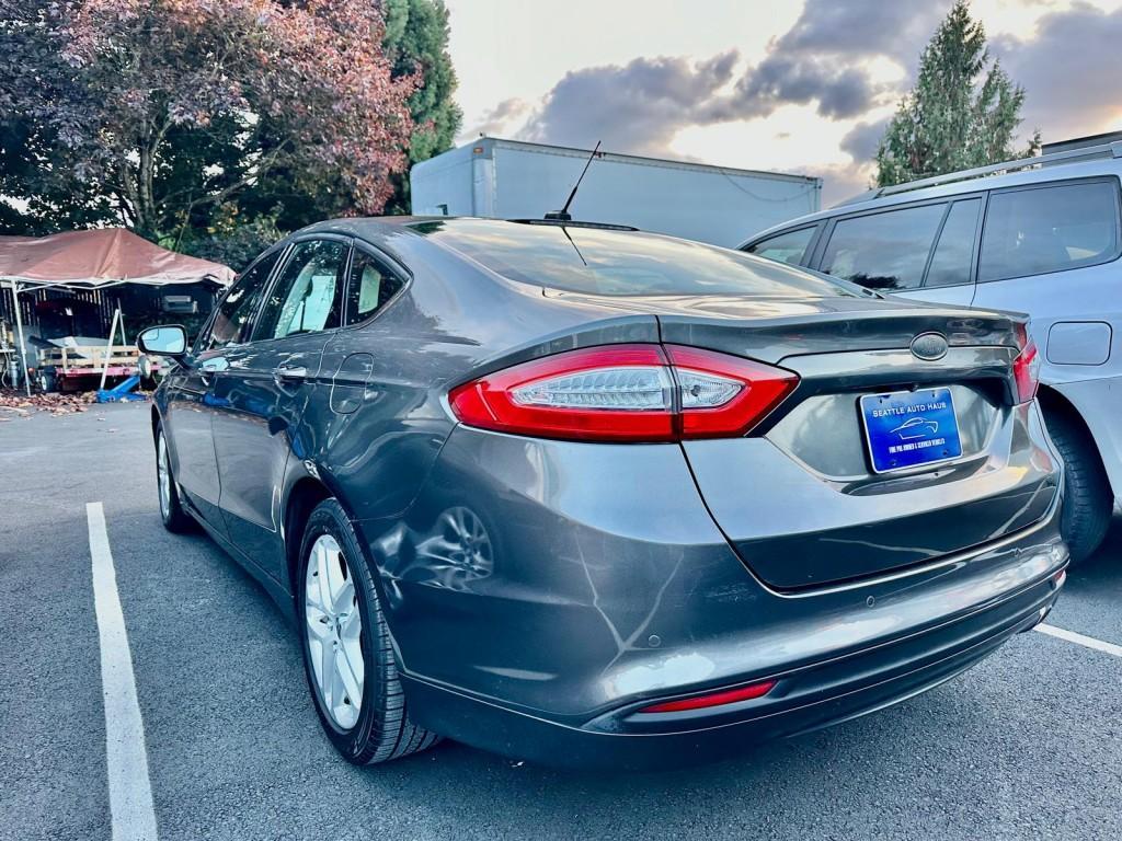 used 2016 Ford Fusion car, priced at $6,999