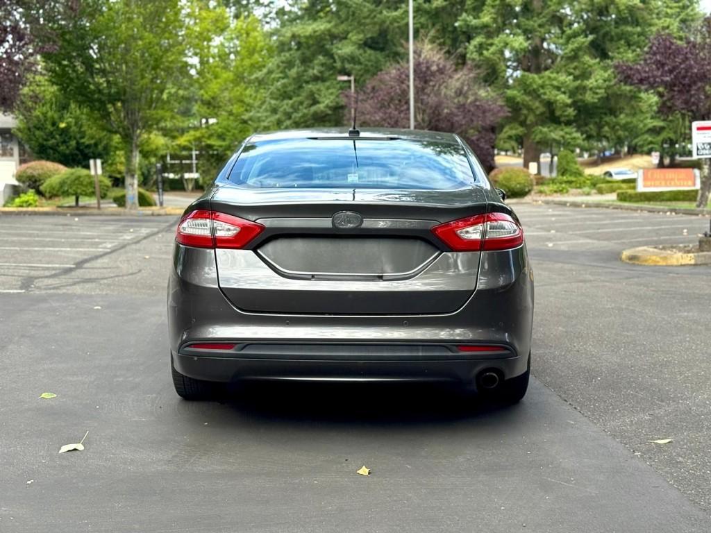 used 2016 Ford Fusion car, priced at $6,499