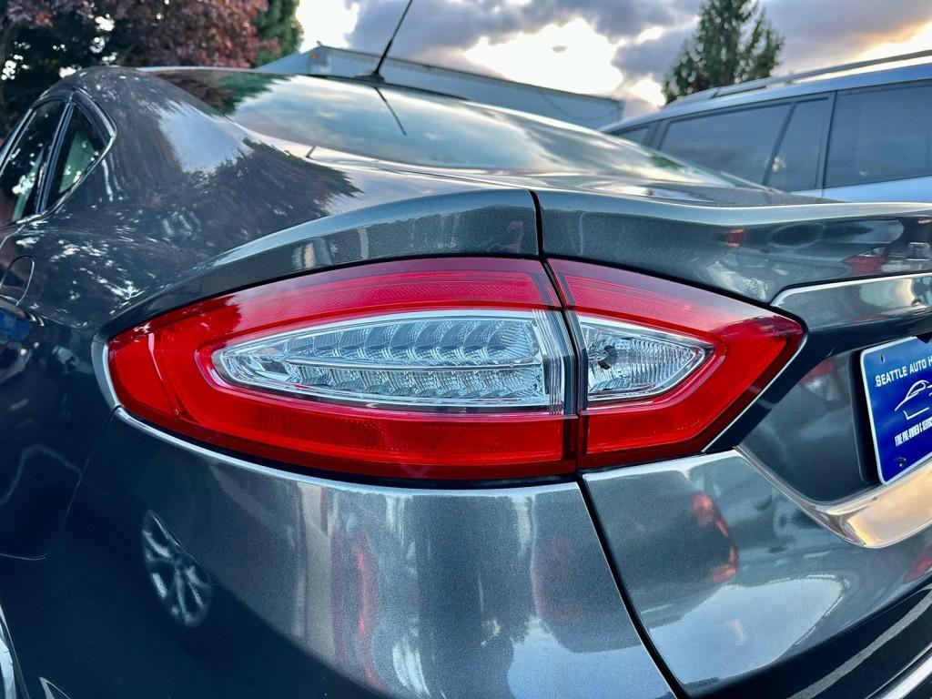 used 2016 Ford Fusion car, priced at $6,999