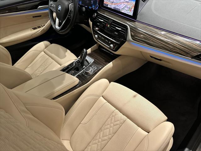 used 2022 BMW 530e car, priced at $34,513