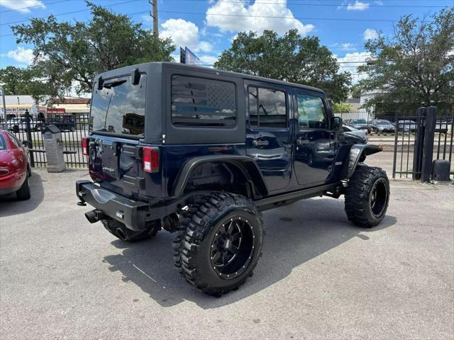 used 2013 Jeep Wrangler Unlimited car, priced at $22,995