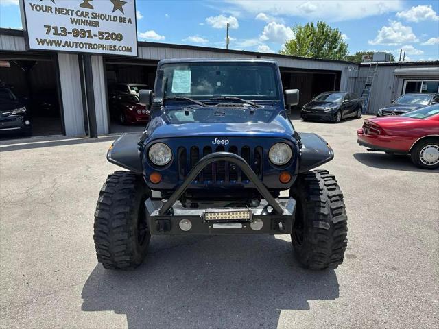 used 2013 Jeep Wrangler Unlimited car, priced at $22,995