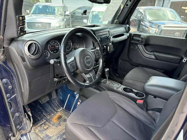 used 2013 Jeep Wrangler Unlimited car, priced at $22,995