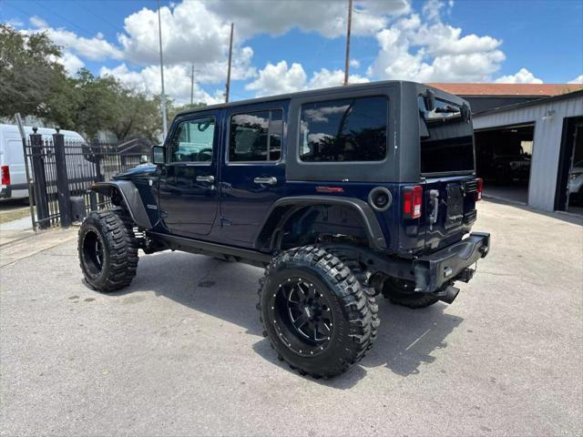 used 2013 Jeep Wrangler Unlimited car, priced at $22,995