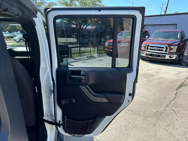 used 2013 Jeep Wrangler Unlimited car, priced at $11,700