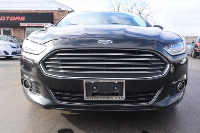 used 2015 Ford Fusion car, priced at $6,995