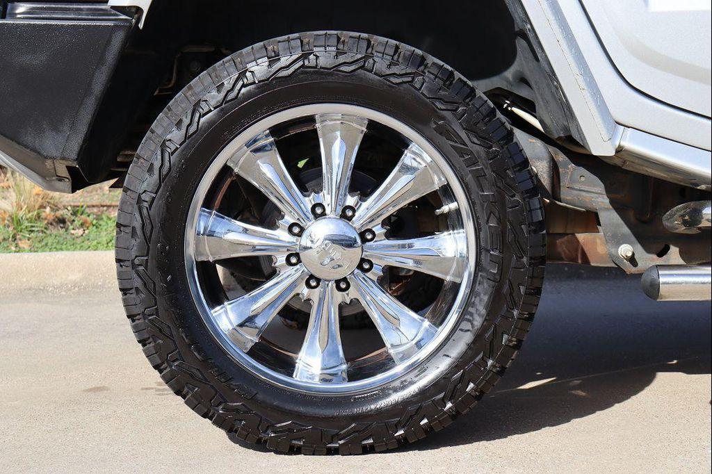 used 2009 Hummer H2 car, priced at $32,989