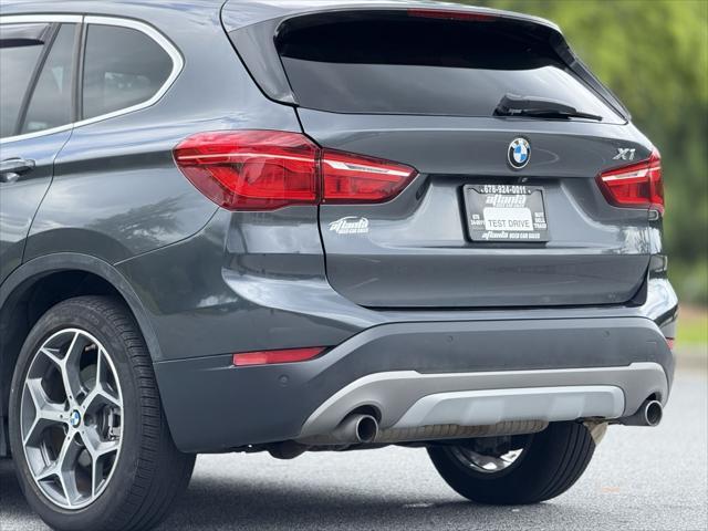 used 2016 BMW X1 car, priced at $11,949